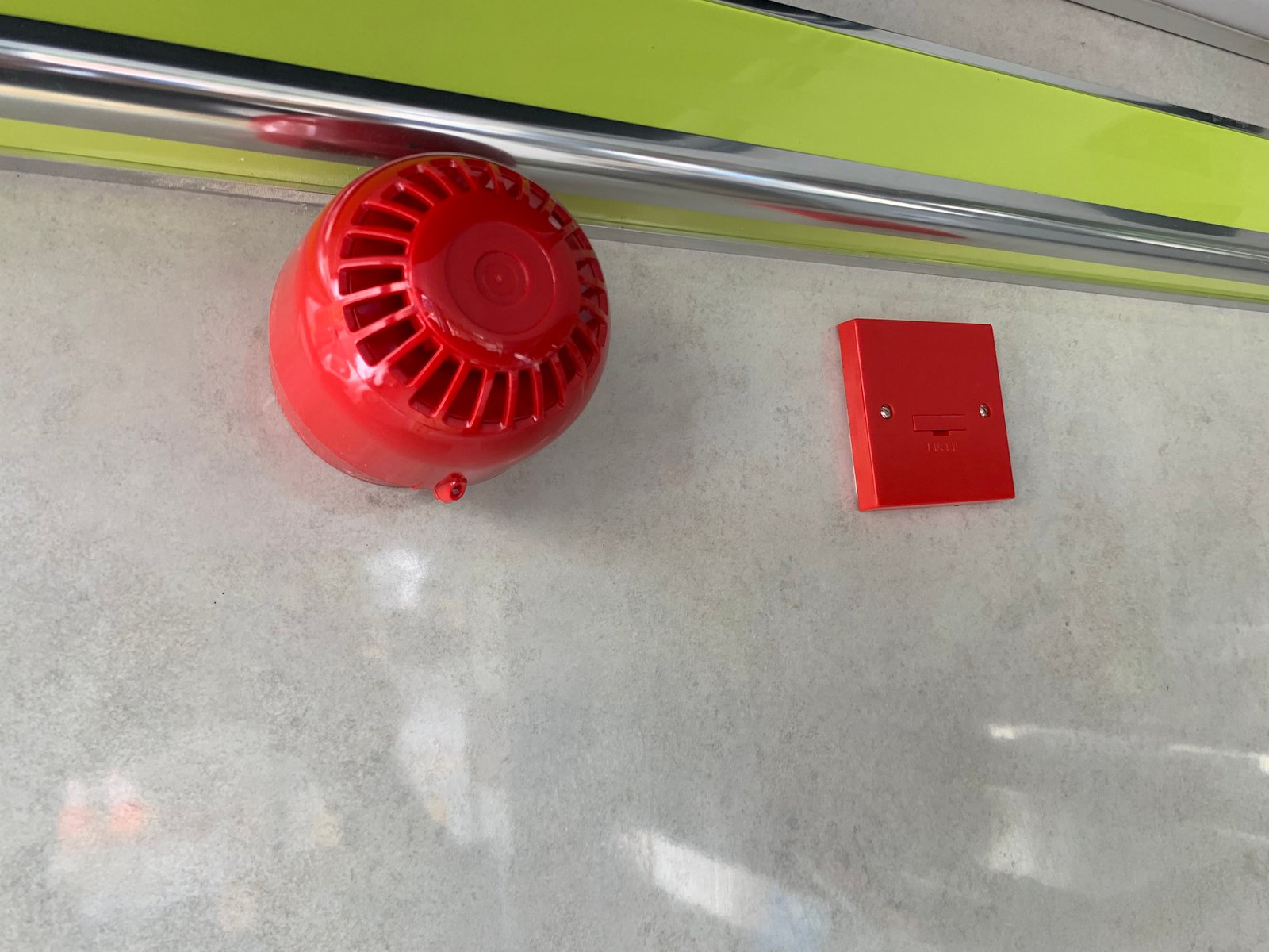 Fire alarm installation being carried out by a Wisenet Security engineer