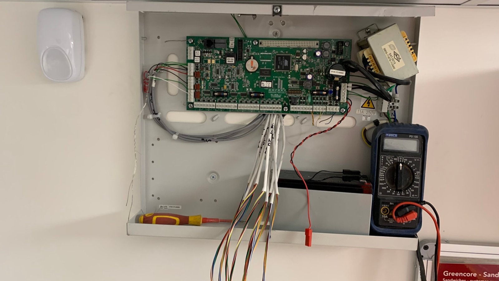 Wisenet alarm system control panel installed in a Newport office