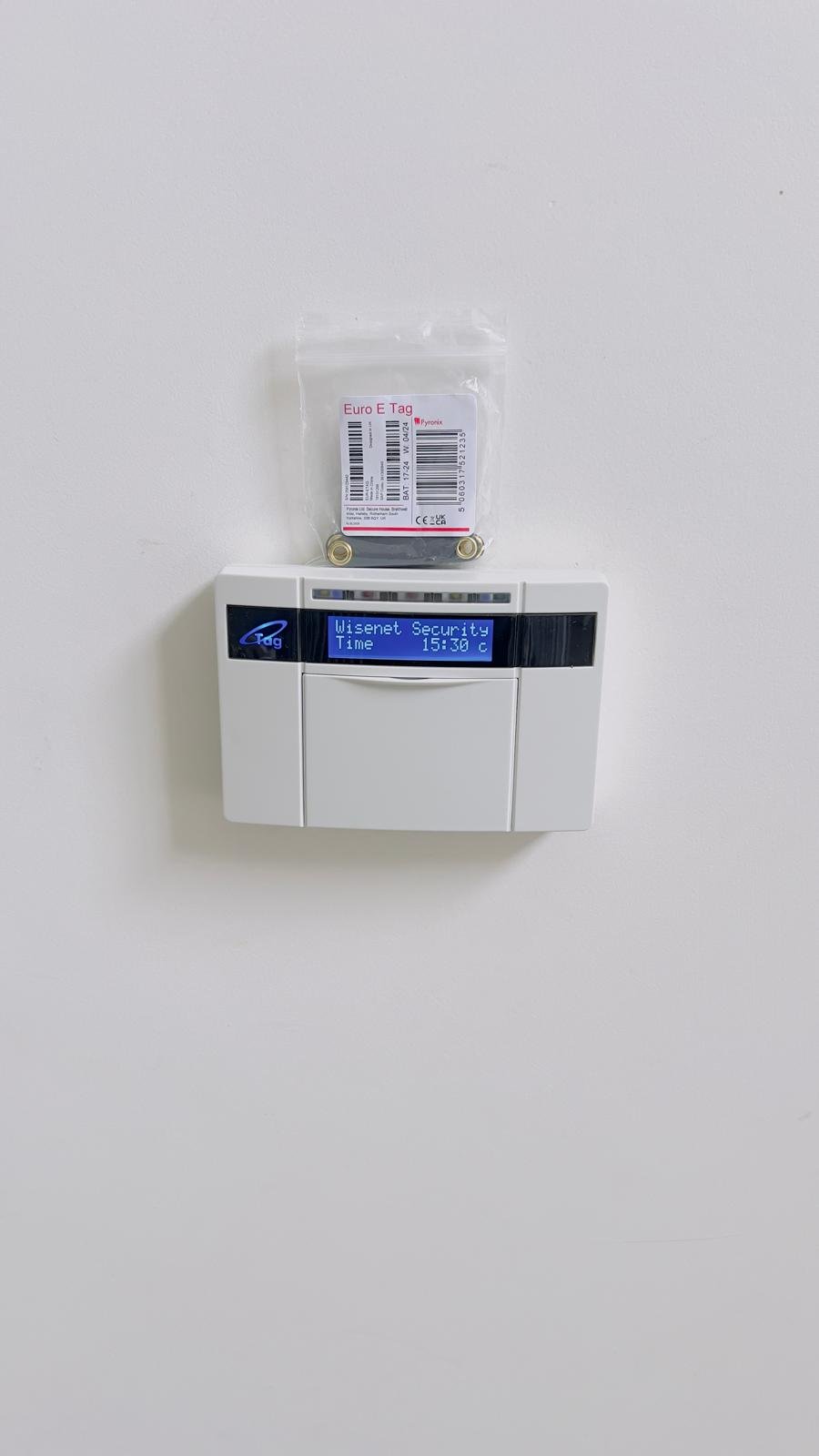 Modern alarm system keypad in a stylish home in Penarth